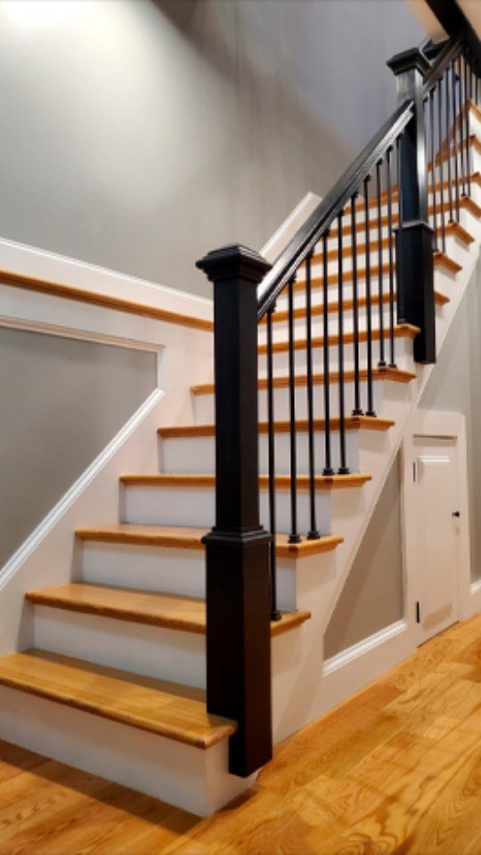 Custom staircase with iron railings